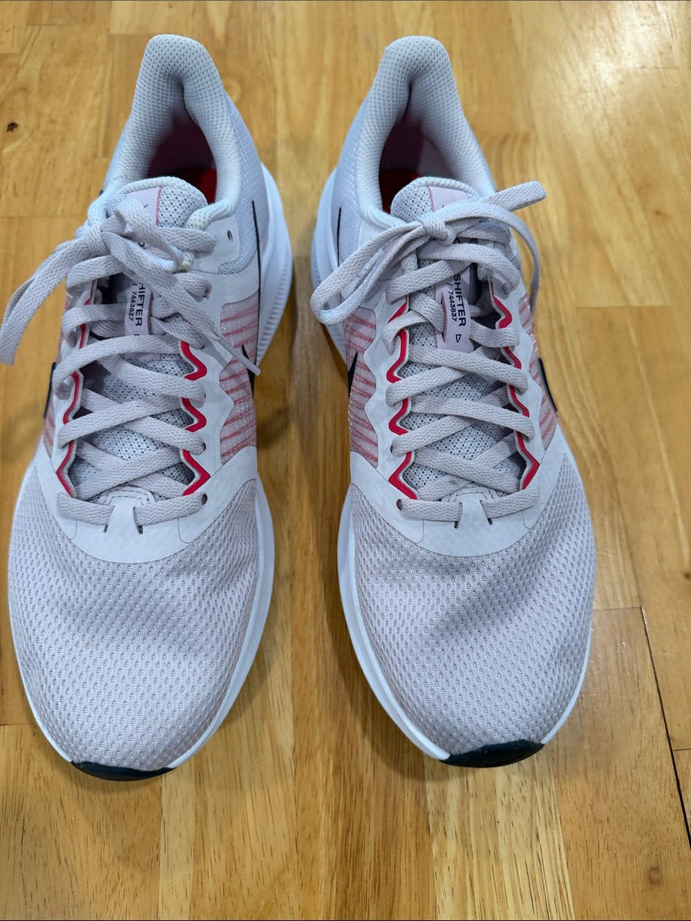 Nike Women's Light Gray Running Shoes with Pink Trim